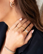 gold toi et moi diamond ring stack on models hand