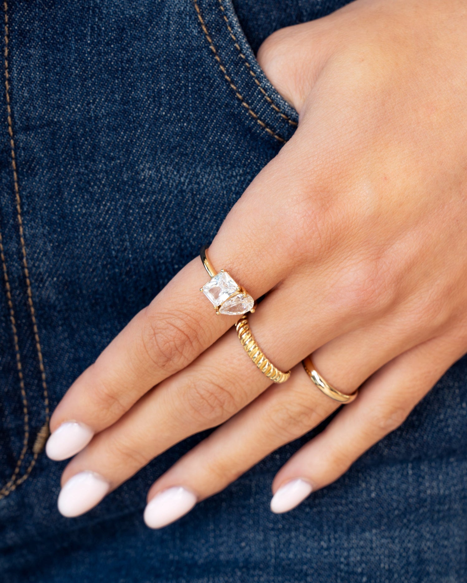 gold toi et moi diamond ring stack on models hand
