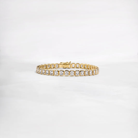 Gold emerald cut diamond tennis bracelet by Sami Jewels