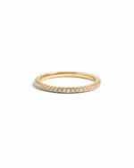 gold diamond eternity ring white background