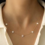 Diamond Flower Pendant Necklace adding a touch of sparkle on model. The perfect gift for her.