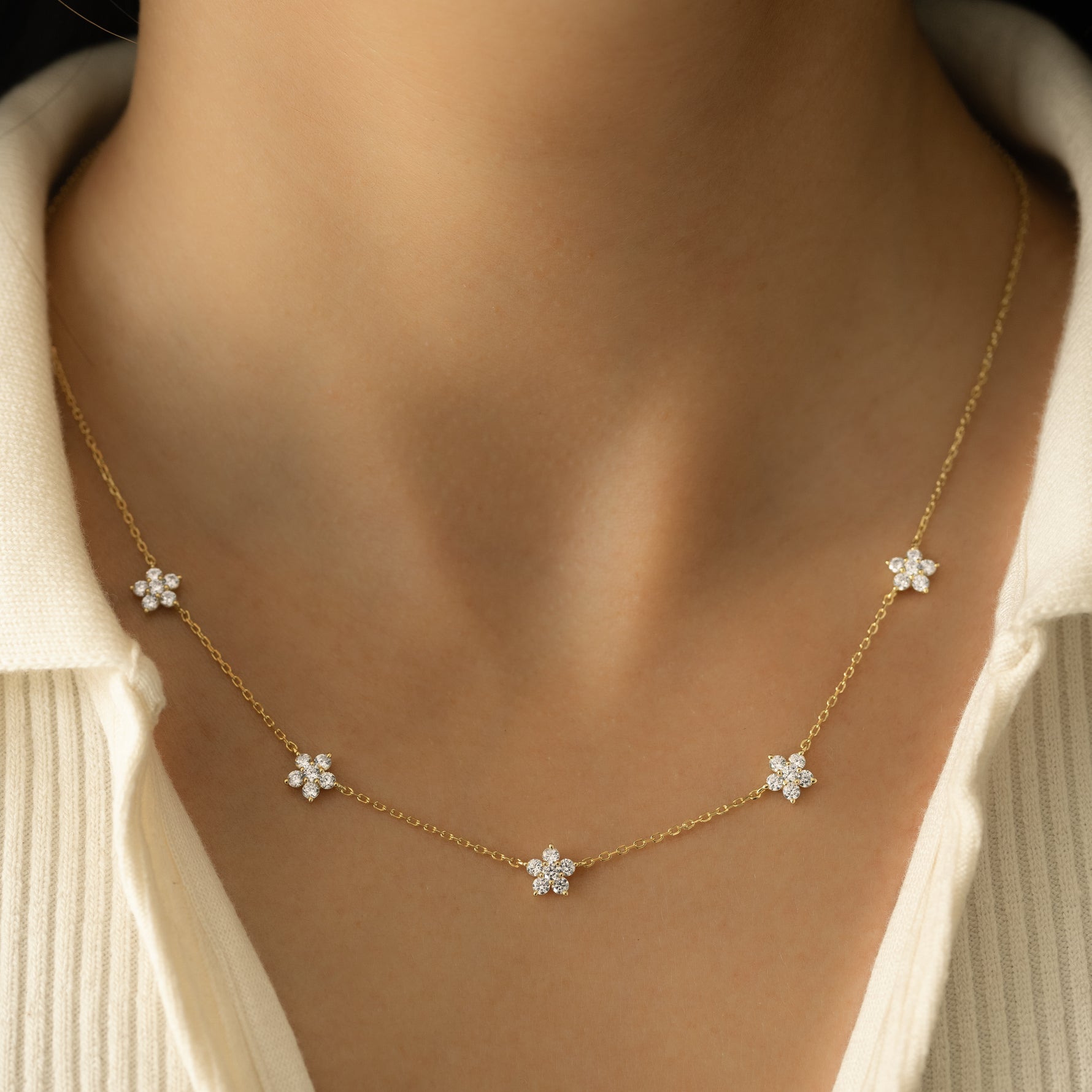 Diamond Flower Pendant Necklace adding a touch of sparkle on model. The perfect gift for her.