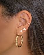 Gold hoop earrings inspired by Madison Beer, featuring stylish and bold design from Sami Jewels.