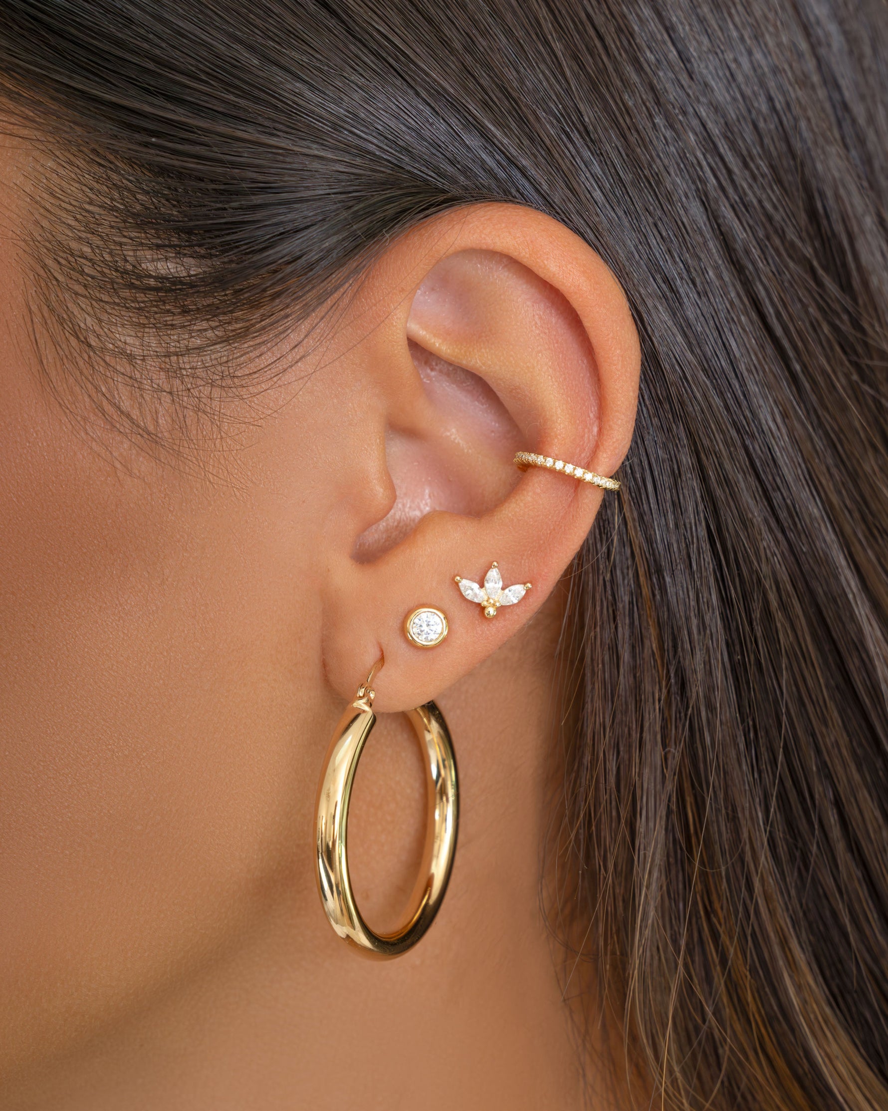 Gold hoop earrings inspired by Madison Beer, featuring stylish and bold design from Sami Jewels.