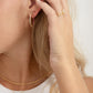 gold hoop earrings with ruby detailing 