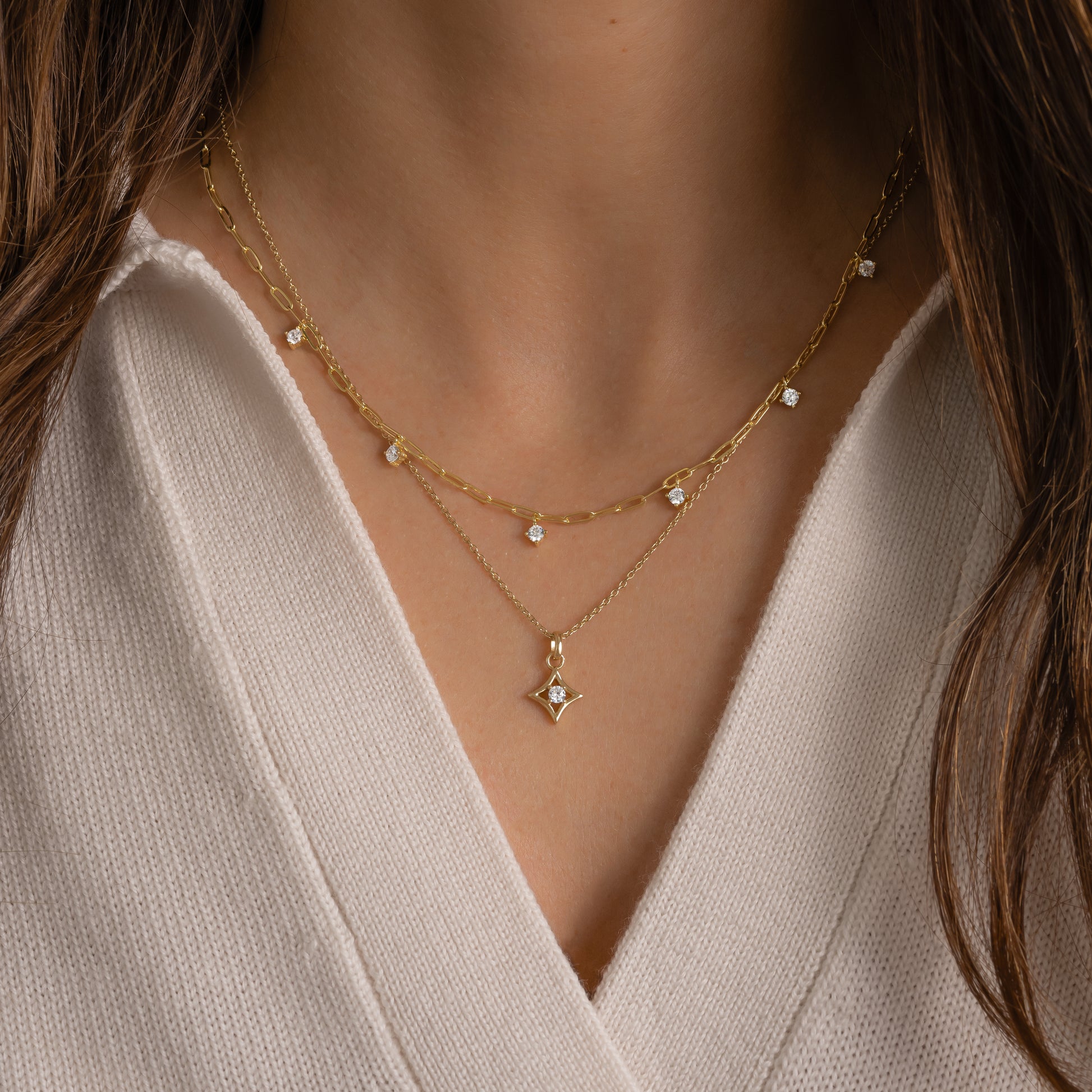 gold paperclip necklace with diamond charms