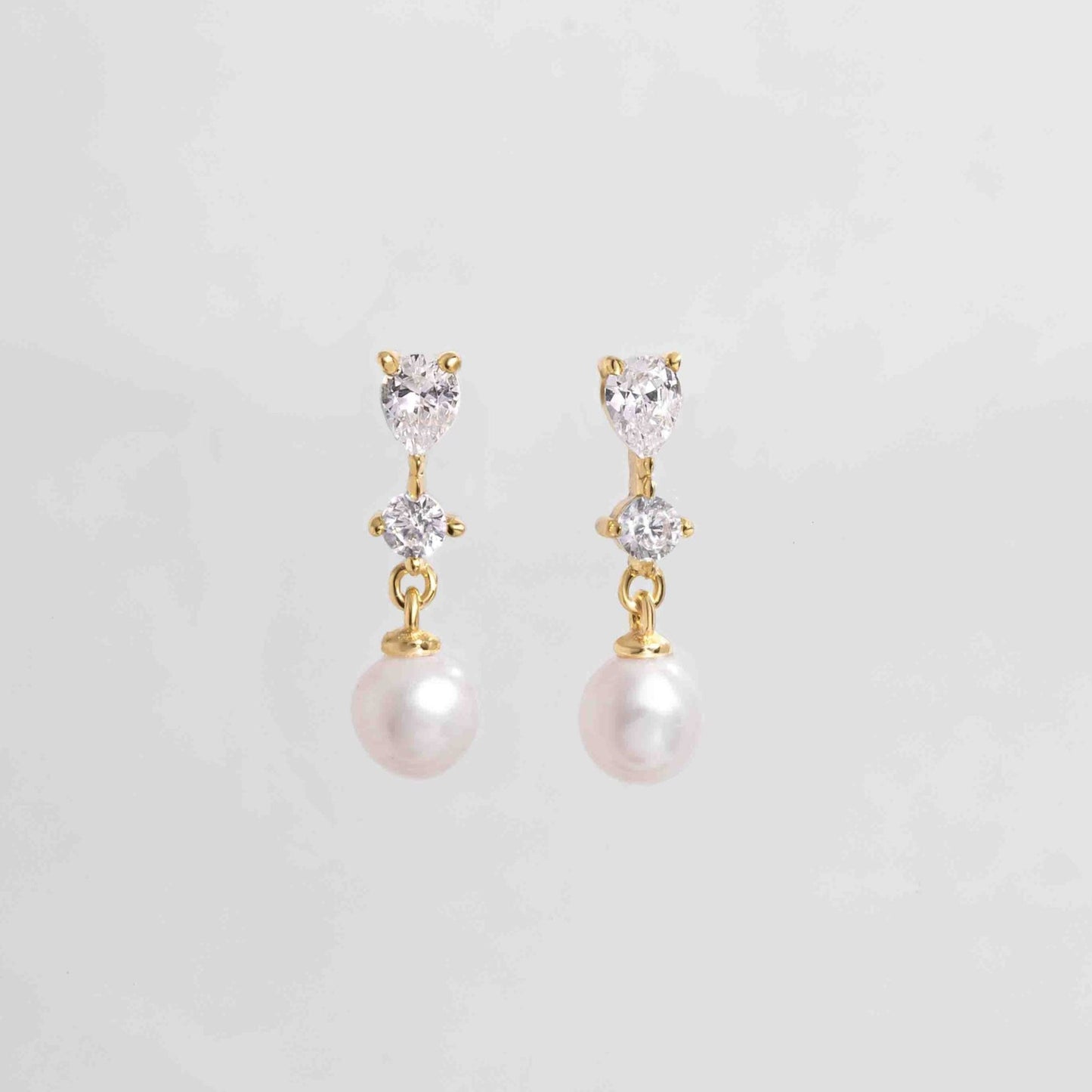 Gold Small Pearl Drop Earrings on white background