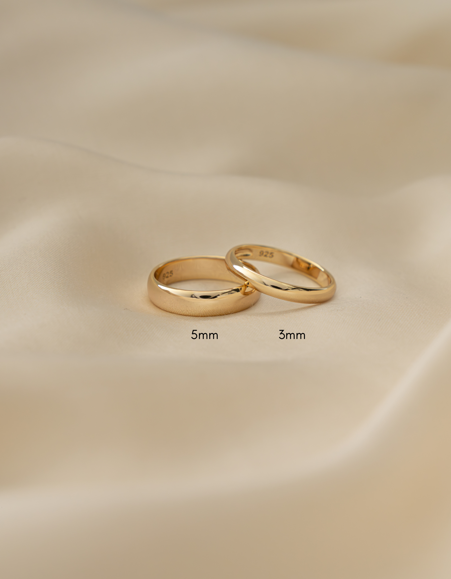 Gold 3mm plain band ring by Sami Jewels, showcasing a smooth, polished gold ring with a simple and elegant design.