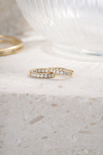 gold plated 10mm in and out studded huggie earrings neutral background