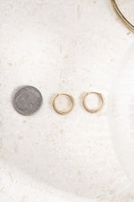 gold plated 10mm diamond studded huggie hoops compared to size of dime 