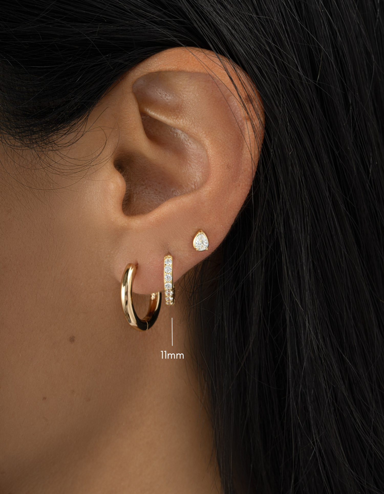 gold plated 11mm studded huggie earring stack on womens ear