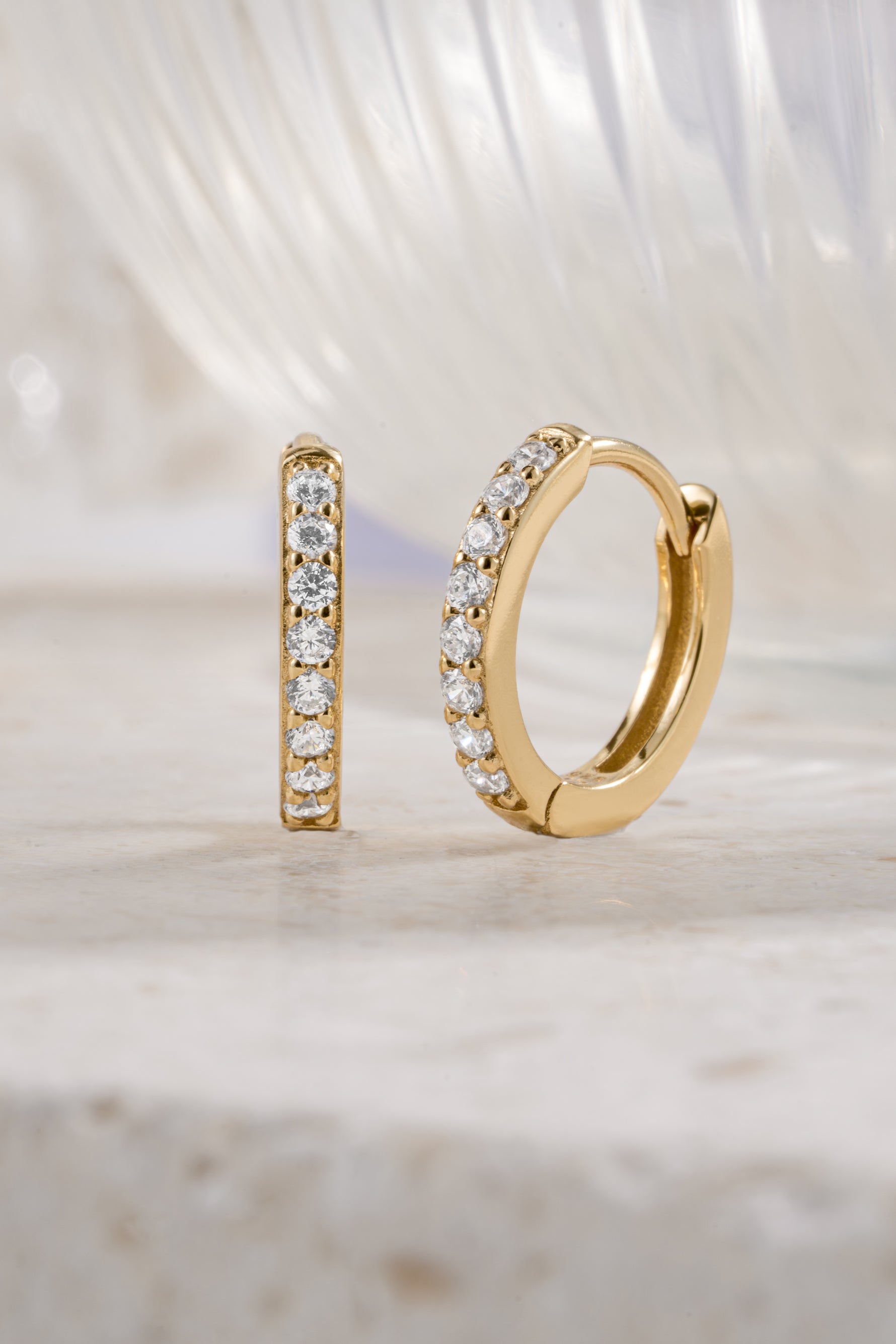 gold plated 11mm diamond studded huggie hoop side view