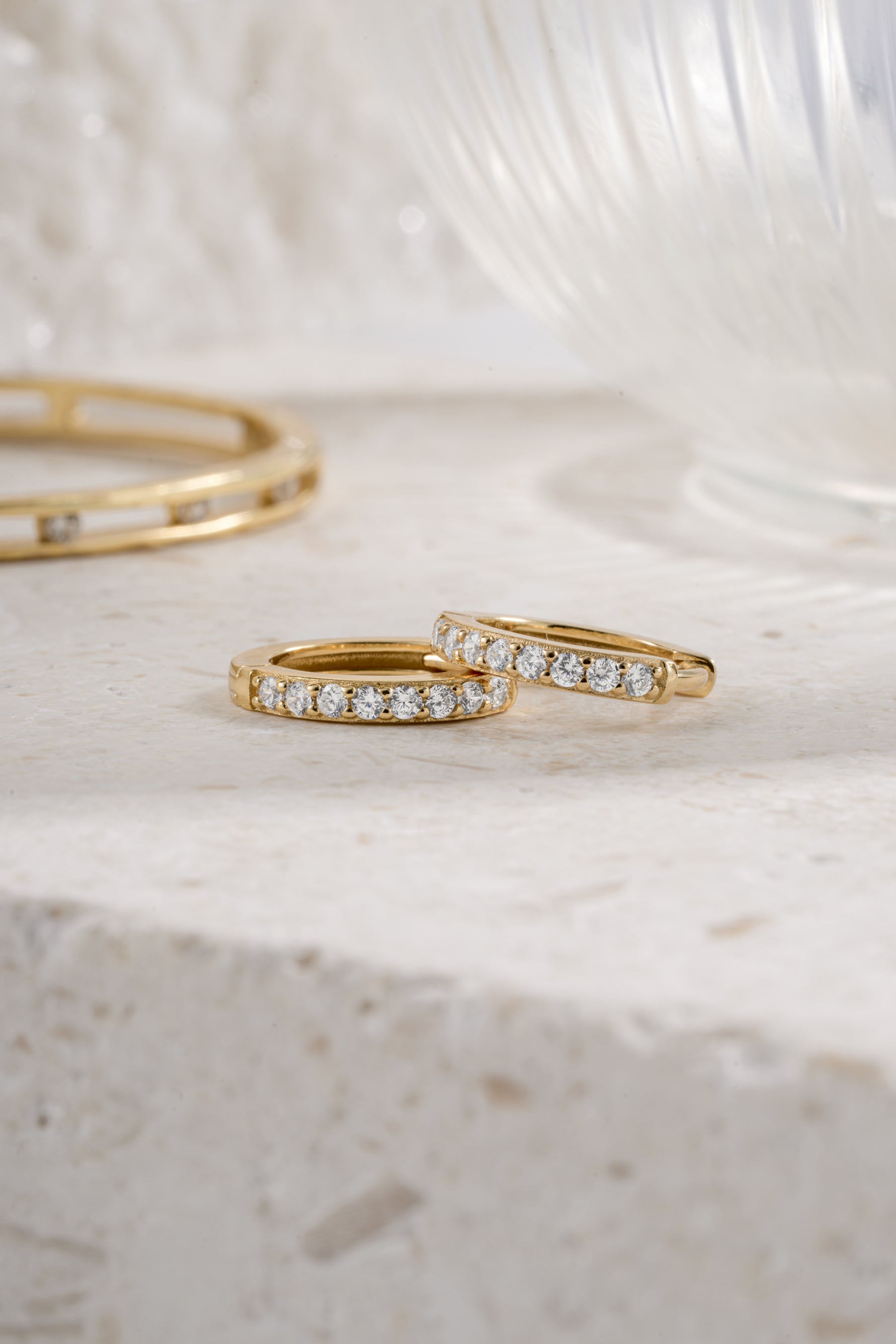 gold plated 11mm studded huggie hoop side view 