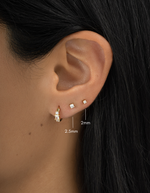 gold plated diamond solitaire stud earring stack in a 2mm and 2.5mm on womens ear 