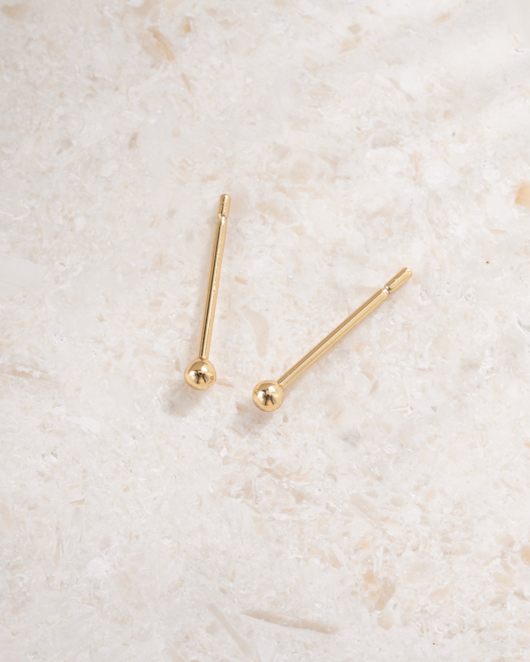 gold 2mm ball studs closeup view