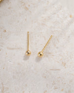 gold 3mm ball stud earrings top view