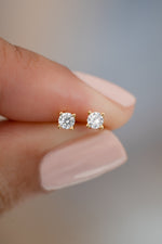 gold plated 3mm solitaire stud earrings closeup view