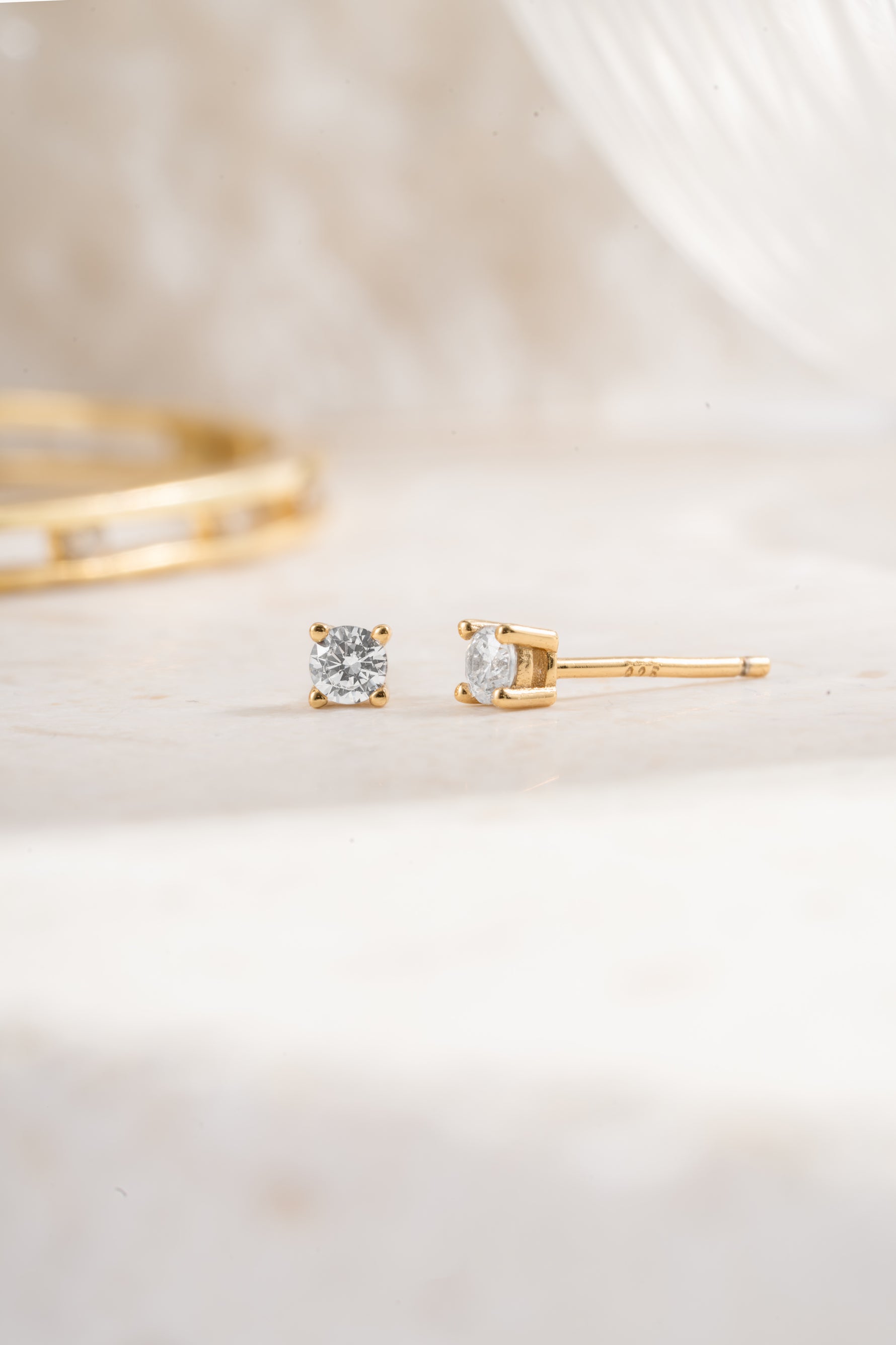 gold plated 3mm diamond solitaire stud earrings white background