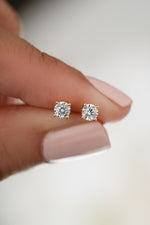 gold plated 4mm solitaire stud earrings closeup view