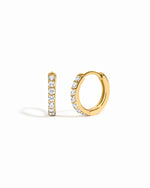gold  8mm diamond huggie hoop on a white background