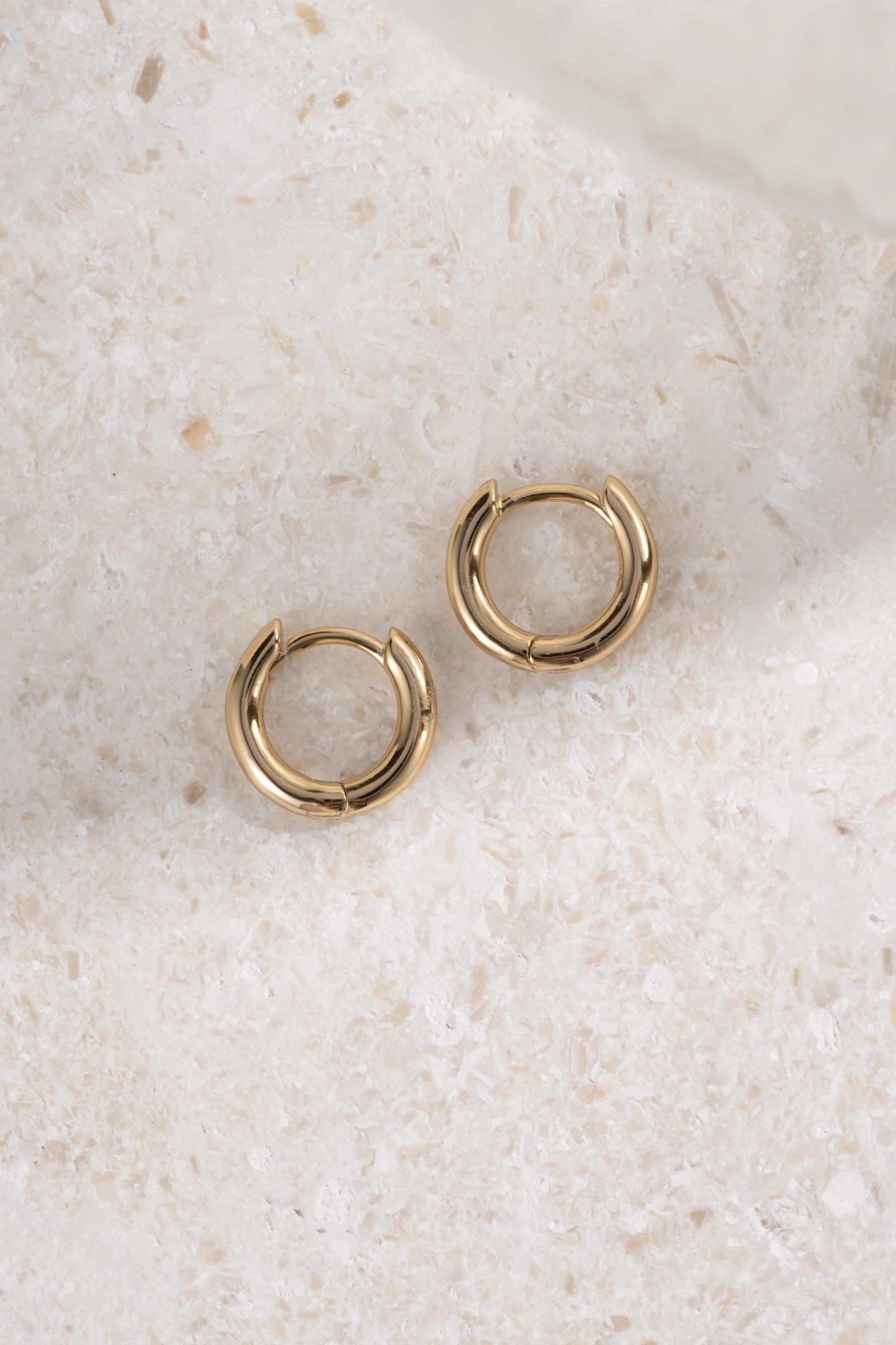 gold 8mm minimalist hoop earrings profile view