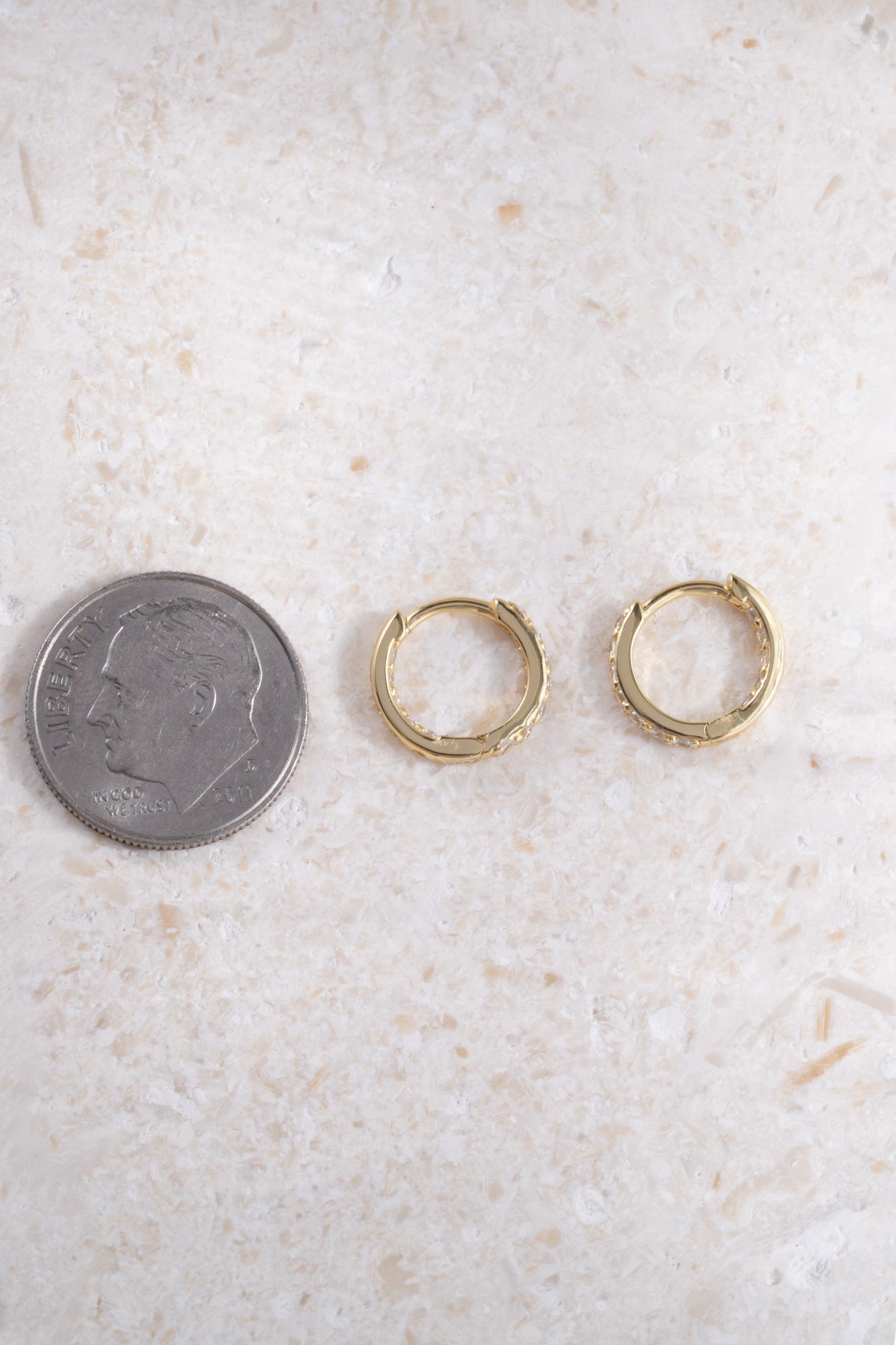 gold plated 9mm diamond studded huggie hoops compared to size of dime 