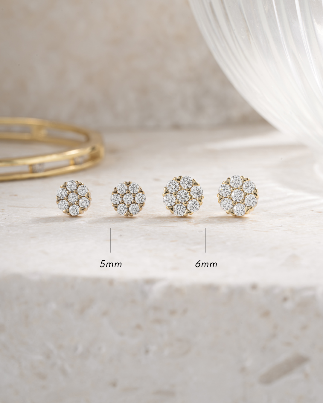 gold plated diamond cluster stud earrings, 5mm and 6mm different sizing, front view
