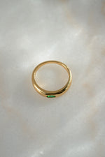 gold emerald bezel set dome ring top view 