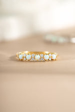 gold opal and cubic zirconia stacking ring stone detailing