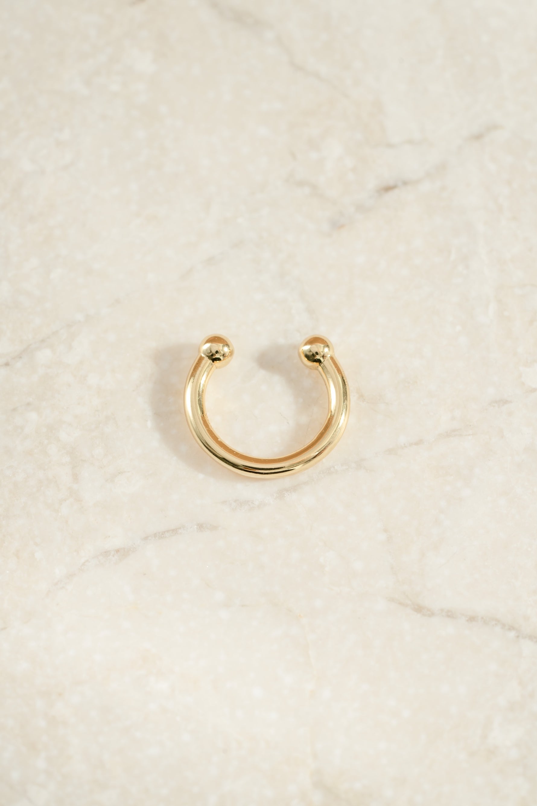 gold plated simple plain ear cuff simple background