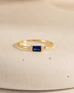 gold sapphire baguette diamond ring front view
