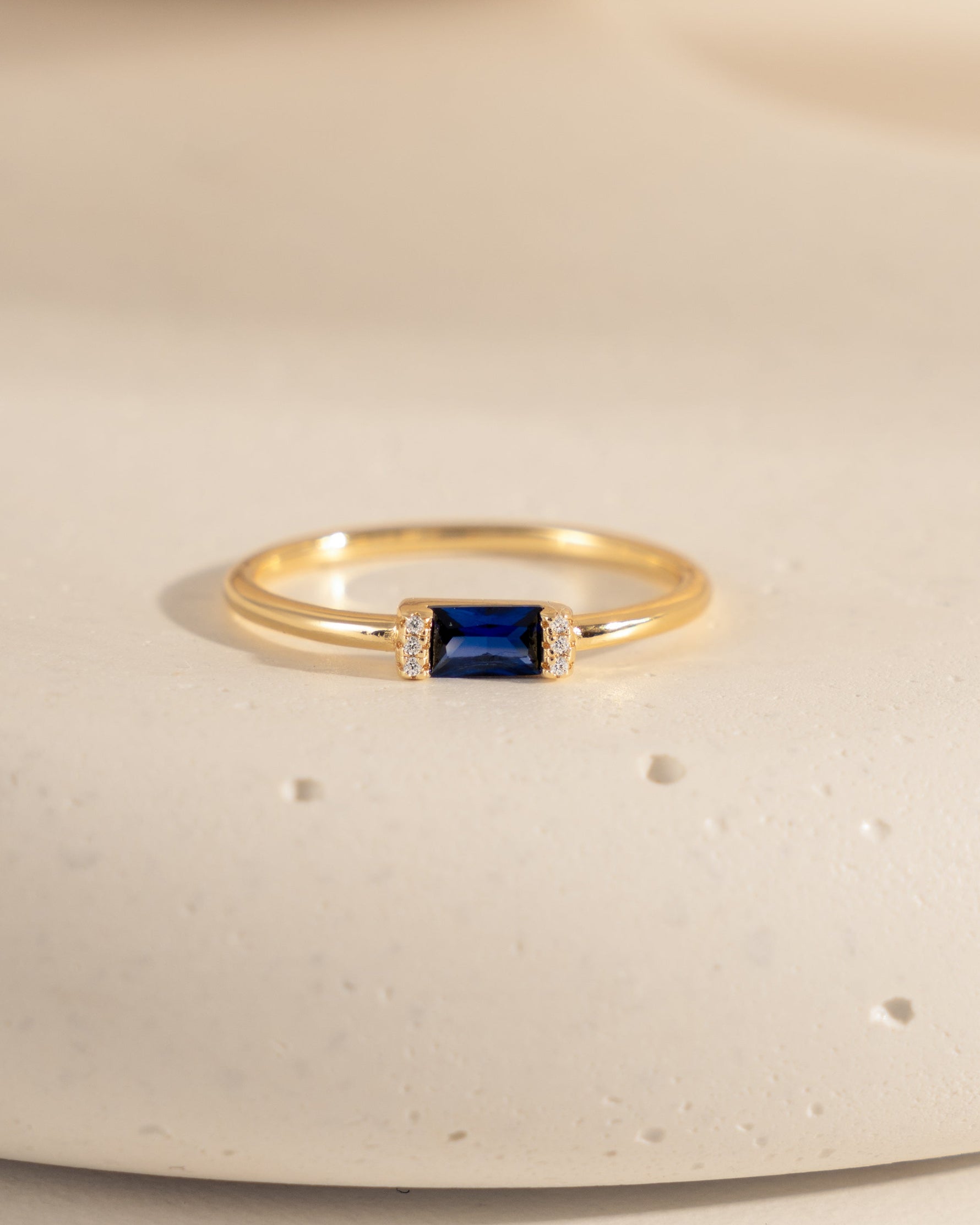 gold sapphire baguette diamond ring front view