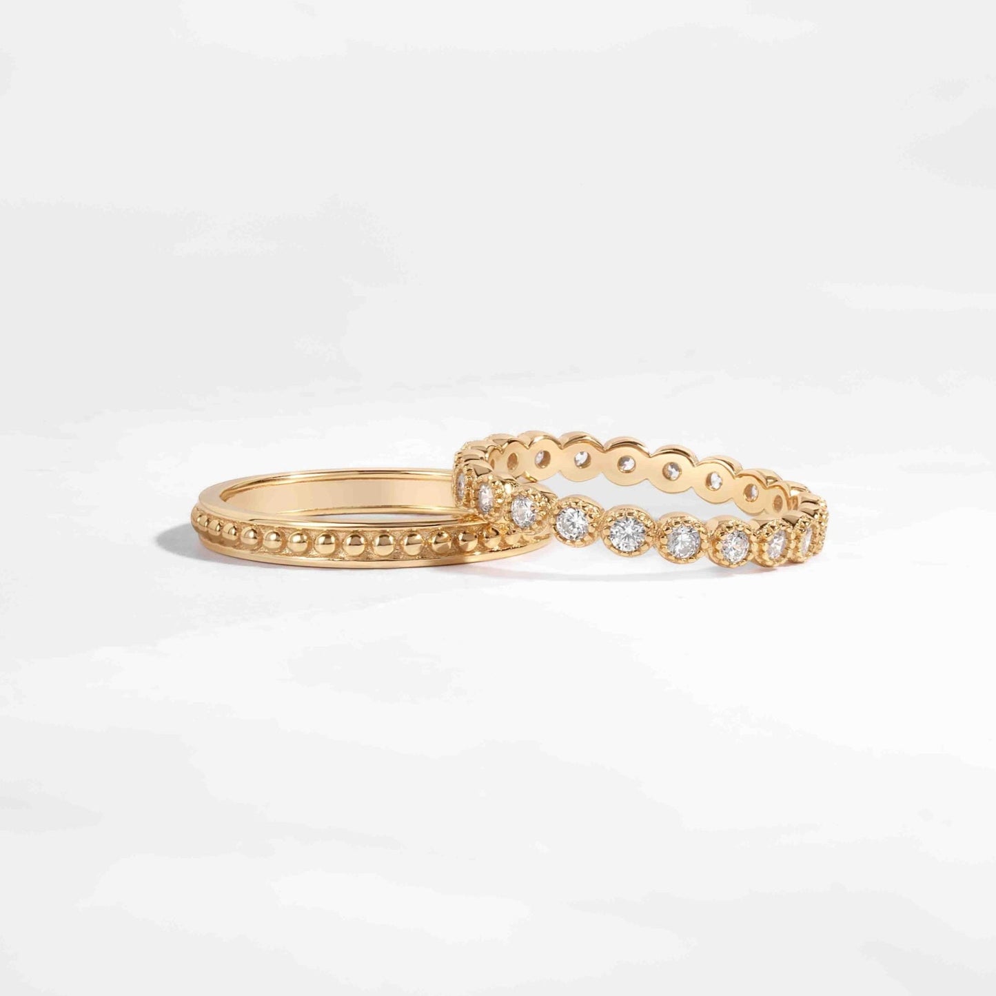 Dainty Diamond Ring Set in 14k gold plated on white background