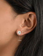Gold 7.5mm round solitaire diamond stud earrings by Sami Jewels, featuring classic and elegant jewelry design.