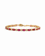 Gold Ruby and Diamond Tennis Bracelet by Sami Jewels featuring sparkling gemstones on a delicate bracelet.