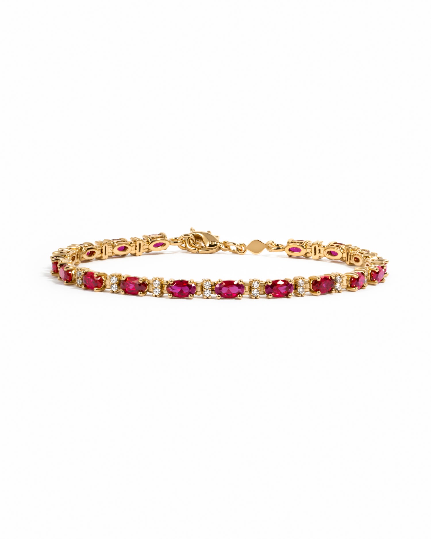 Gold Ruby and Diamond Tennis Bracelet by Sami Jewels featuring sparkling gemstones on a delicate bracelet.