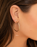 gold textured hoop earrings in 35mm on model