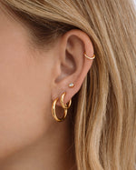 Gold stainless steel SS half-textured hoop earrings by Sami Jewels, showcasing a stylish and waterproof jewelry accessory.