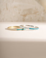 Turquoise and diamond eternity ring by Sami Jewels featuring gold and sterling silver band with alternating stones.