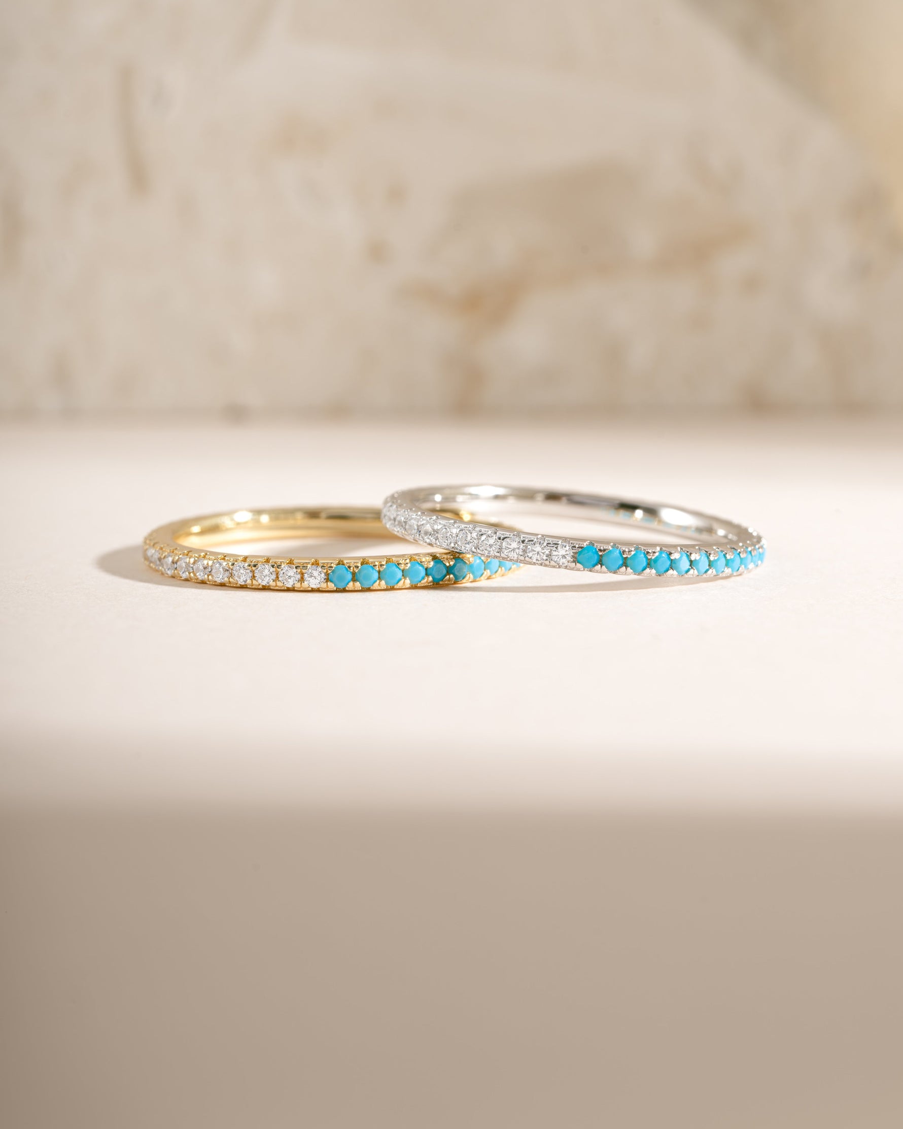 Turquoise and diamond eternity ring by Sami Jewels featuring gold and sterling silver band with alternating stones.