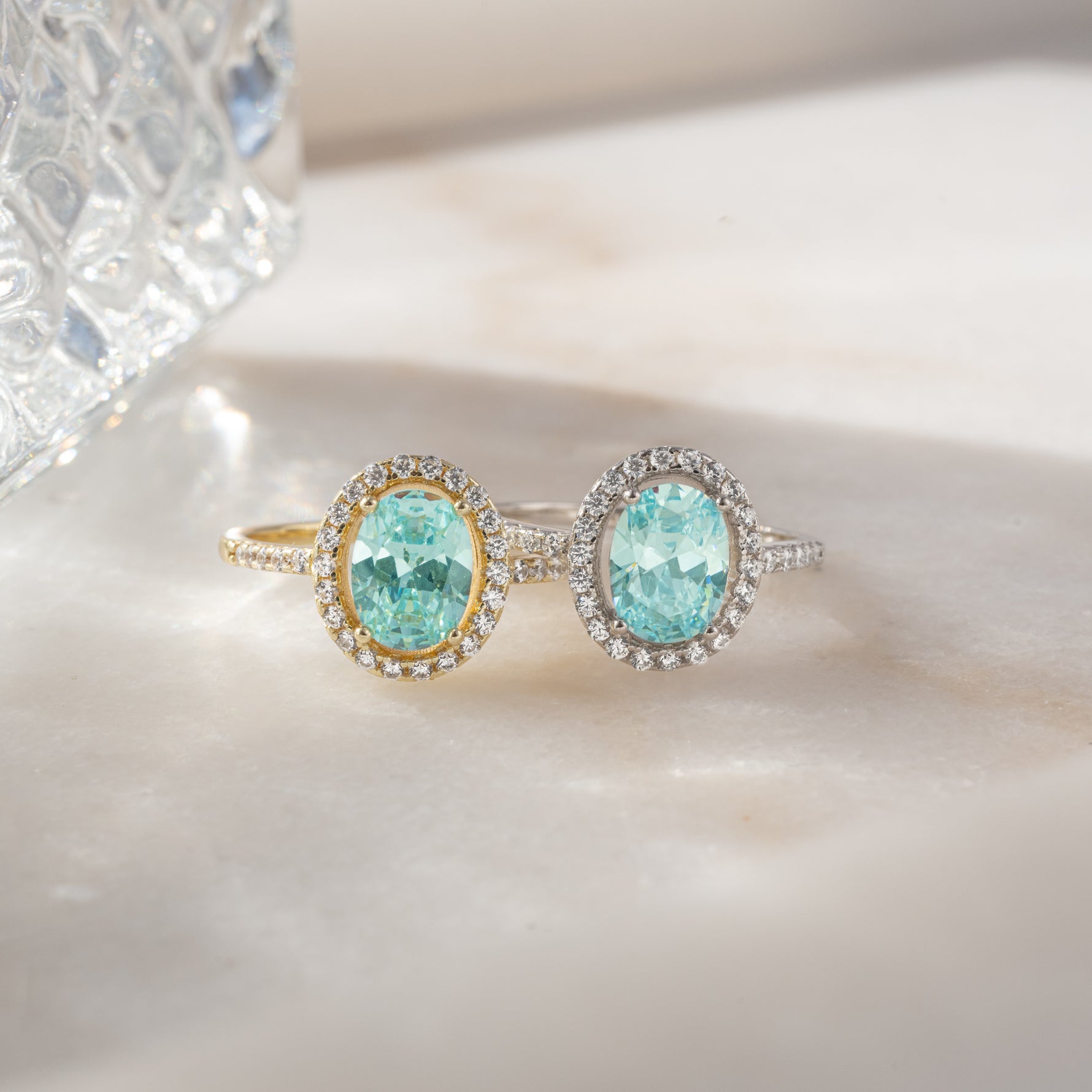 Sami Jewels Jules statement ring with a halo aquamarine gemstone set in gold and sterling silver.