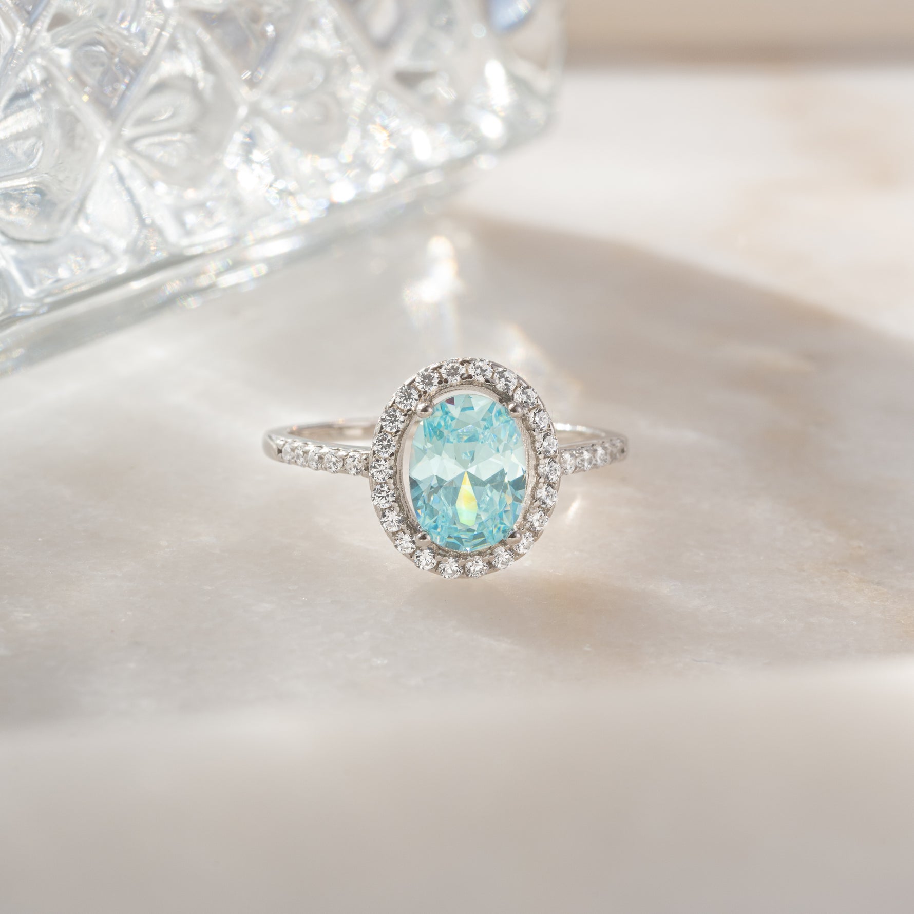 Sami Jewels Jules Statement Ring featuring a halo aquamarine gemstone set in sterling silver.
