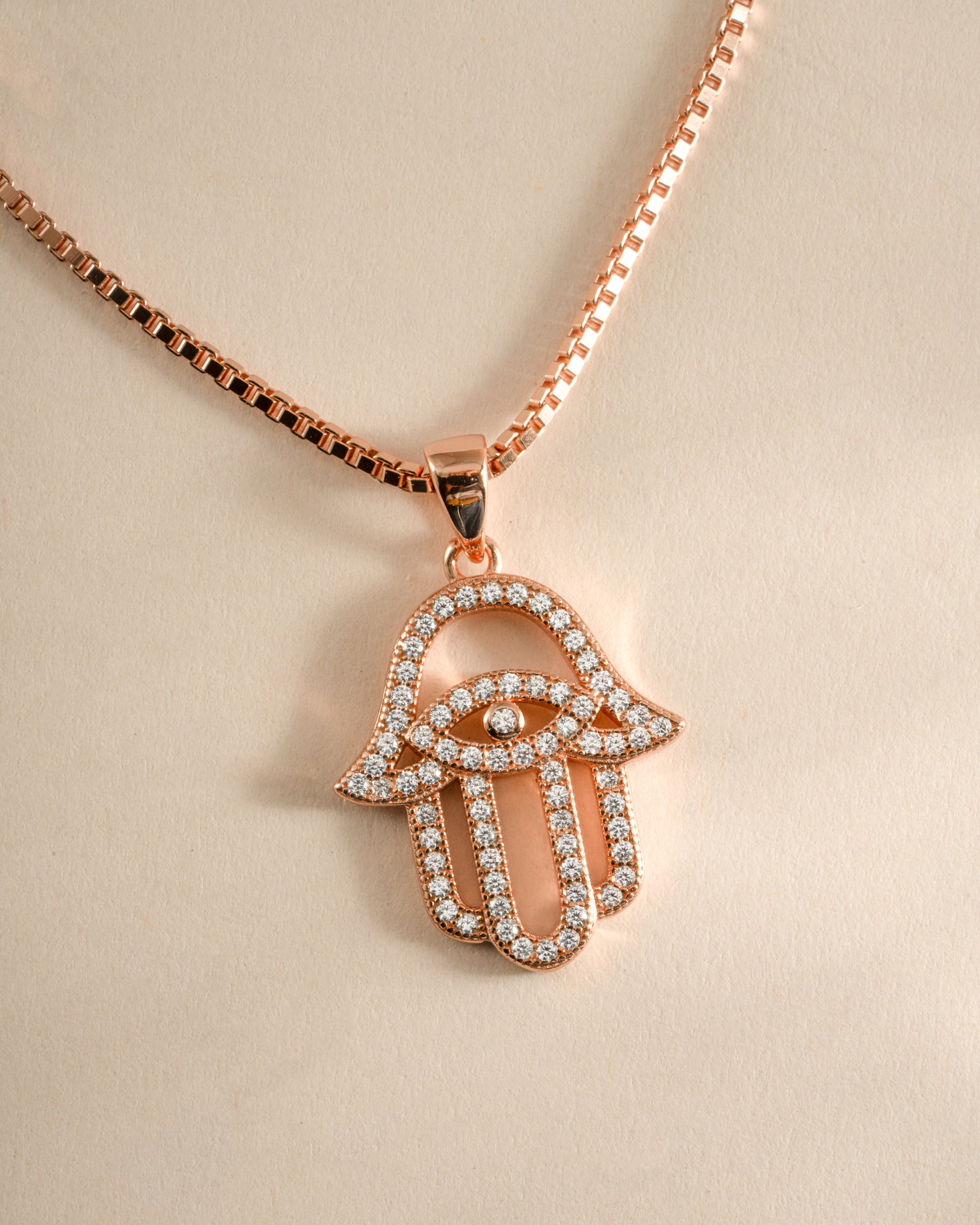 Rose gold Hamsa necklace from Sami Jewels featuring a detailed Hamsa pendant on a delicate chain.