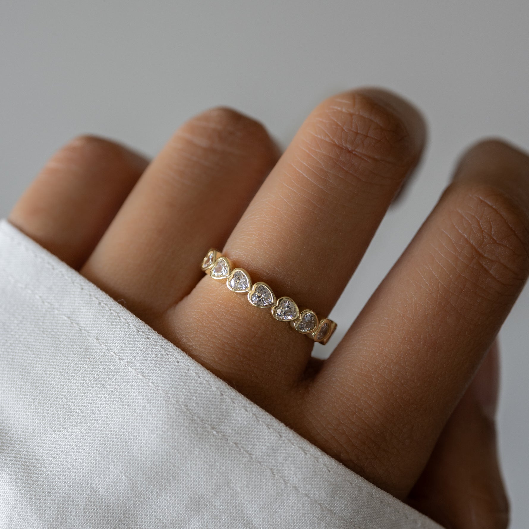 model wearing a heart ring 