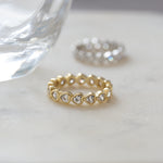 dainty gold heart shaped eternity ring