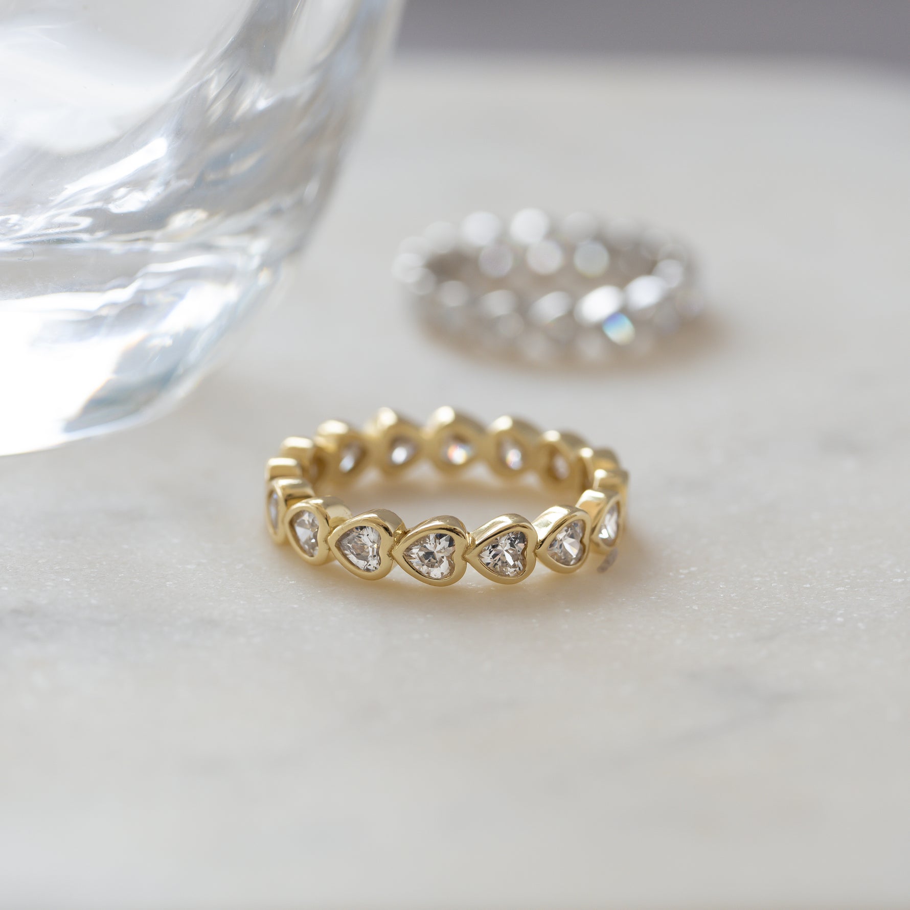 dainty gold heart shaped eternity ring