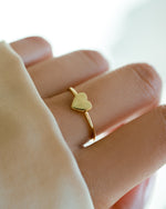 Gold Valentina Heart Ring by Sami Jewels worn on finger, featuring a heart-shaped design and elegant craftsmanship.