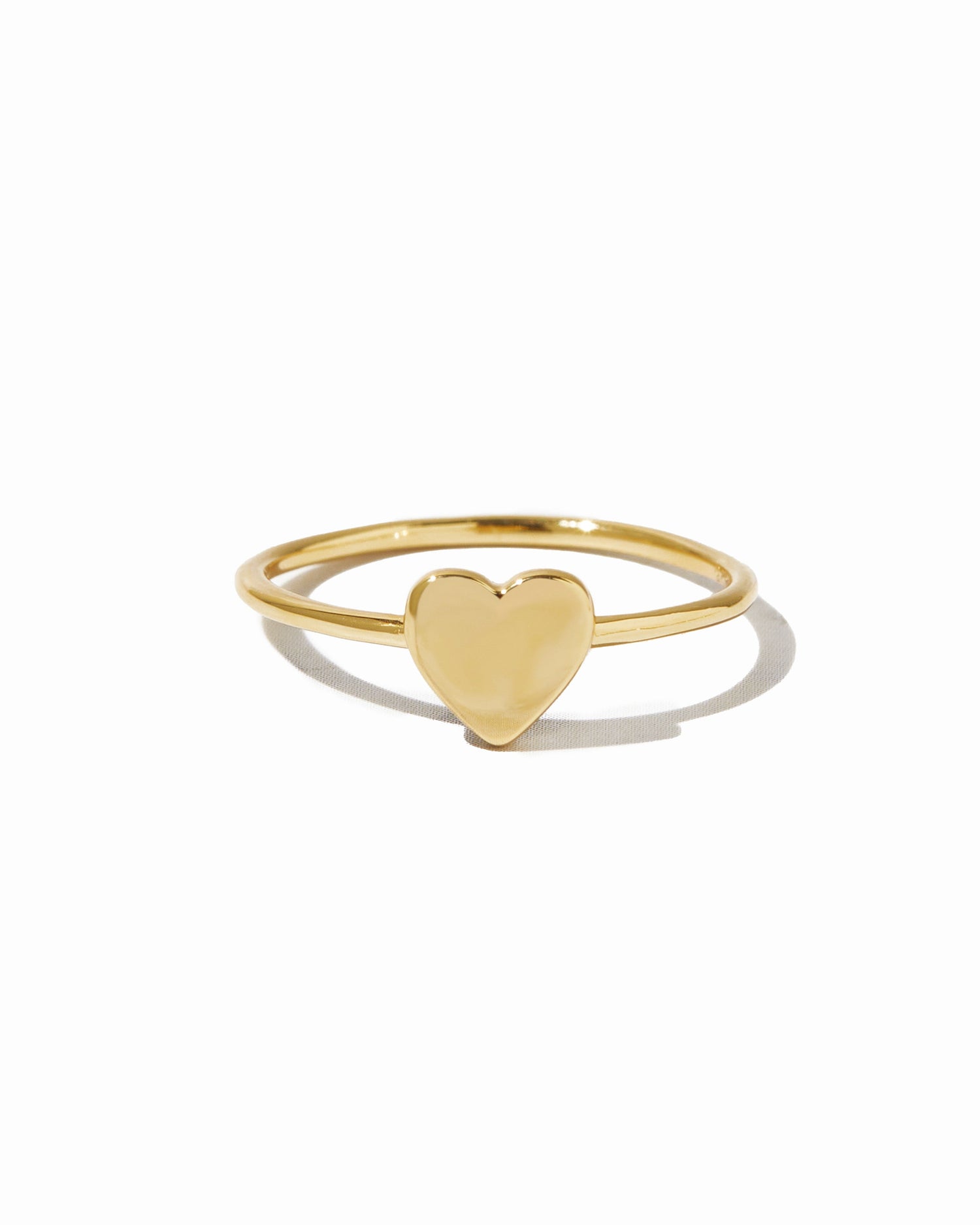 Gold Valentina Heart Ring by Sami Jewels featuring a heart-shaped design on a white background.