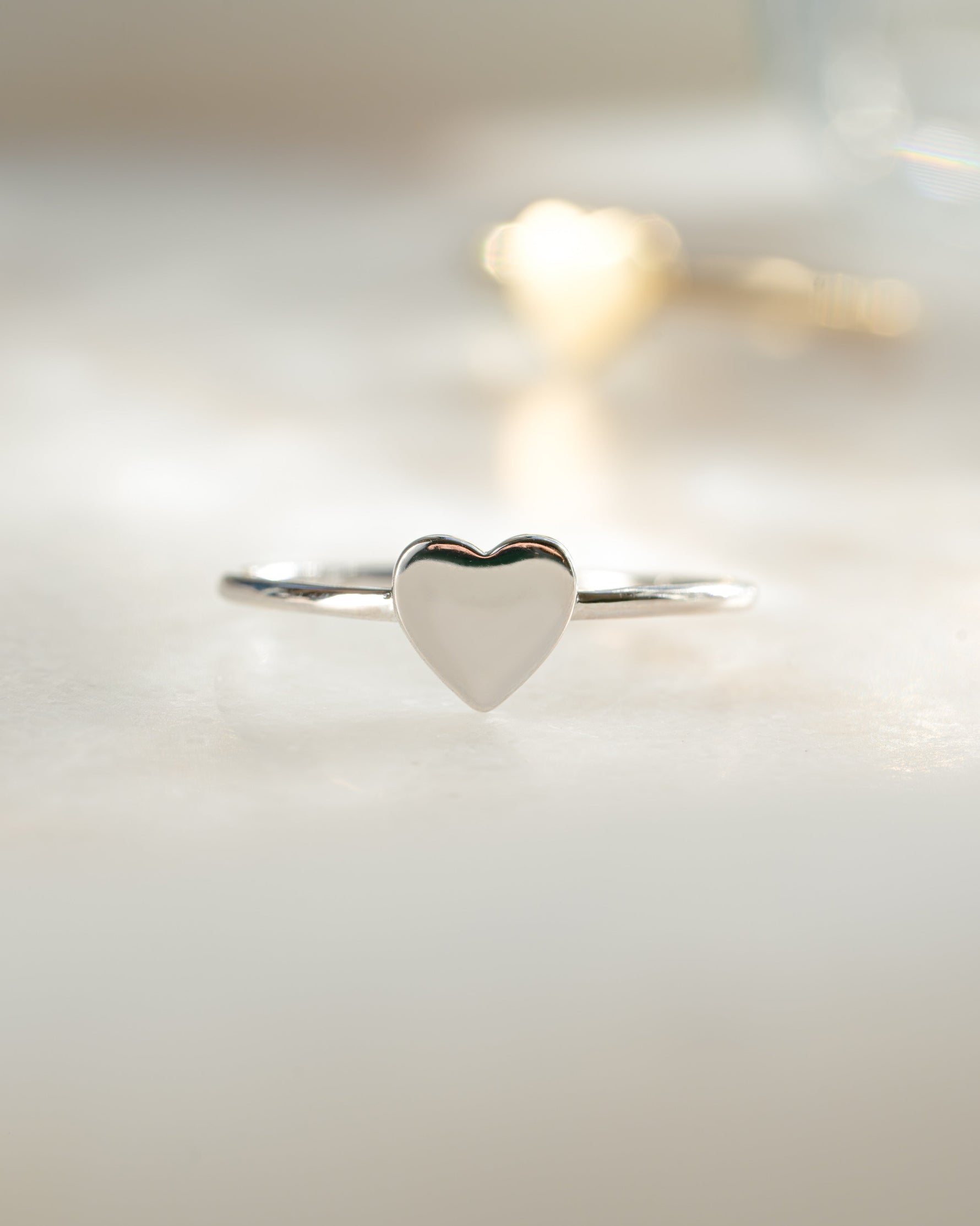 Sterling silver Valentina Heart Ring by Sami Jewels featuring a prominent heart design, front view of the ring.