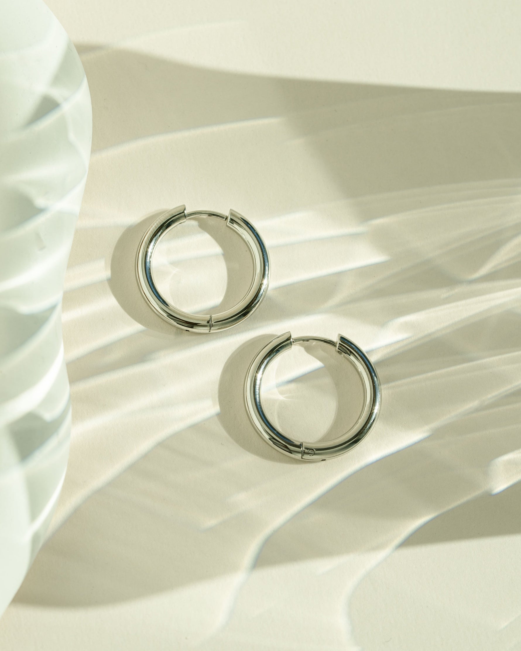 Silver stainless steel SS Plain Tube Hoop Earrings by Sami Jewels, hinged design with waterproof finish.